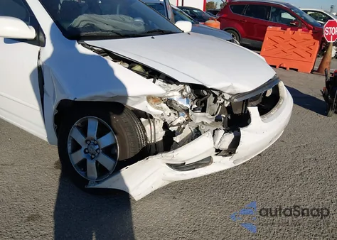 2004 Toyota Corolla Le from USA, damaged, VIN 1NXBR32E94Z296073